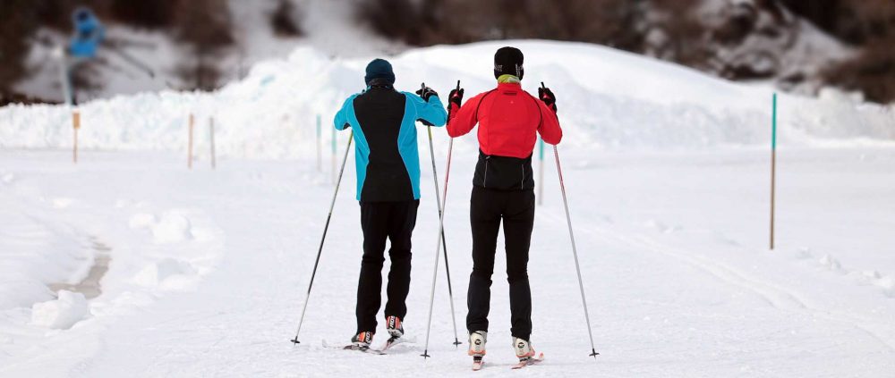 Pair of XC skiers head out ahead of group
